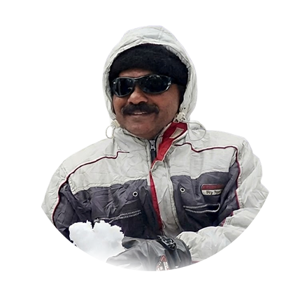 Suresh M G